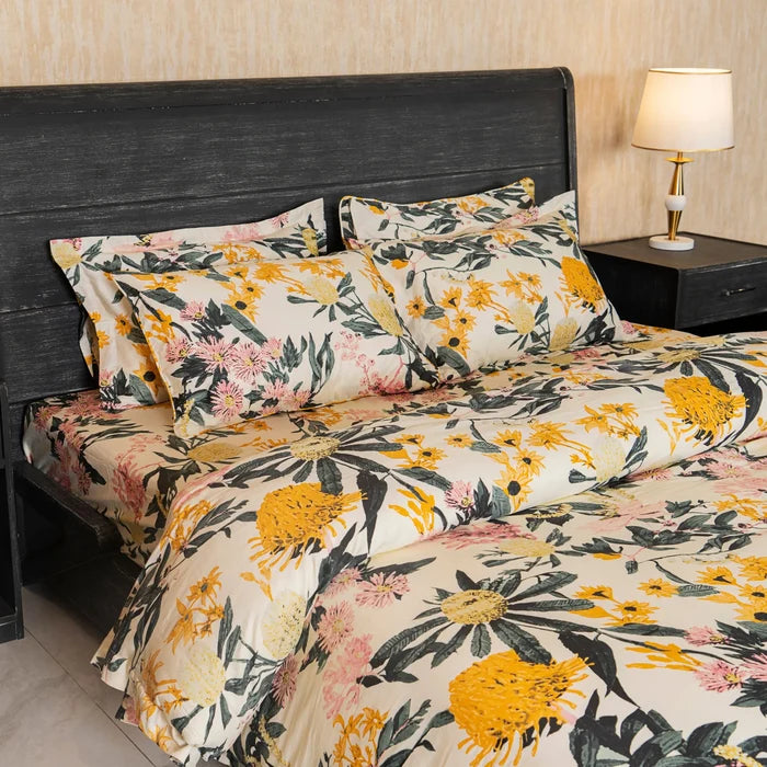 Floral bed set: cream duvet with yellow and pink blooms, matching pillowcases