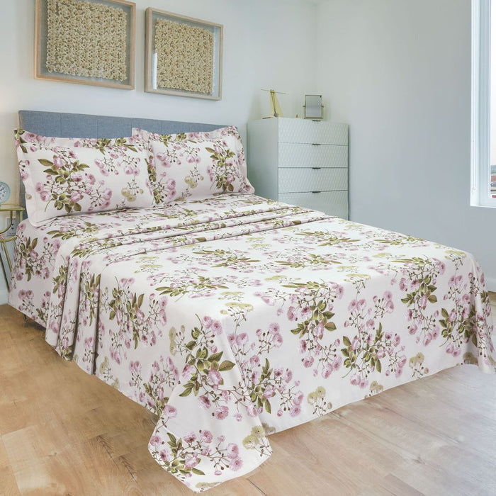 Floral bed sheet with light background and pink purple green flower pattern