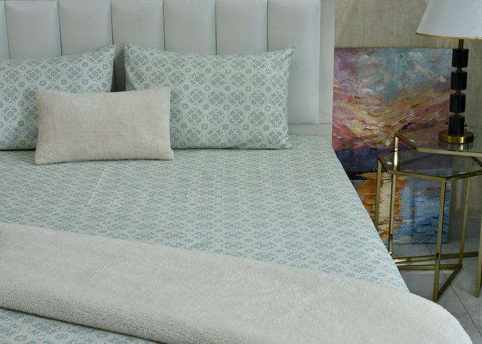 Ice blue cotton sateen bed sheet with matching patterned panel and corner