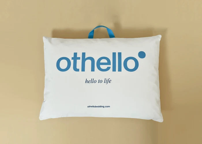 Cloudia filled pillow with othello logo, stitched edges, white cover
