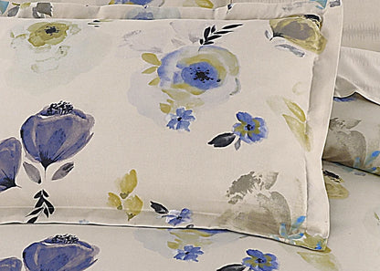 Cream cotton pillow cover with blue flowers and green leaves, plain edges