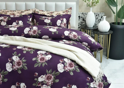 Purple floral quilt cover, folded with matching pillow sham
