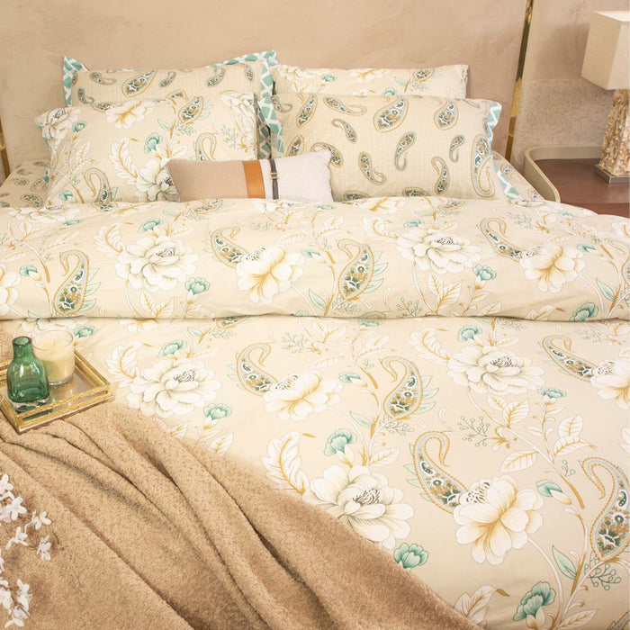 Quilt cover with cream, teal paisley and white floral print; matching pillow shams