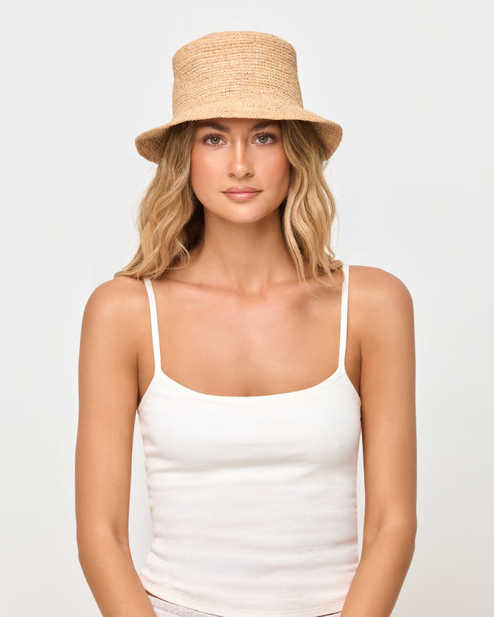 LSPACE Isadora bucket hat in natural, close-up detail view on model.
