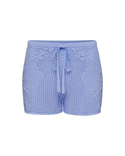 Off-model view of the LSPACE Island Time Short in Chambray, an open-knit crochet short with a floral motif and drawstring waist.