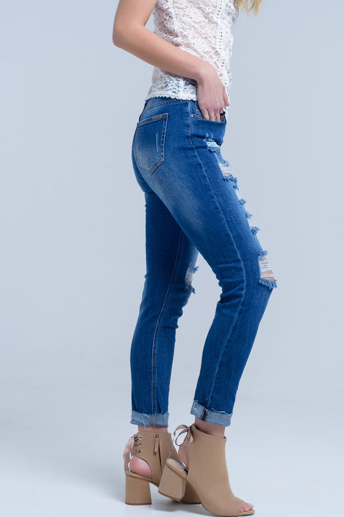 Jean with shredded rips and raw-cut cuffs - Denim