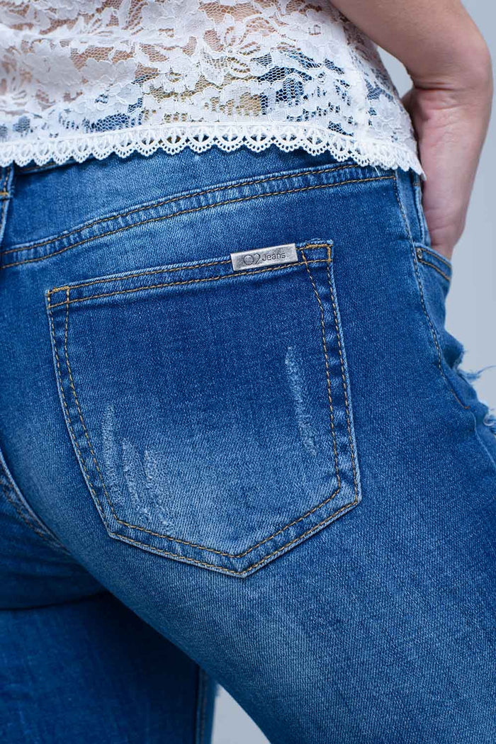 Jean with shredded rips and raw-cut cuffs - Denim