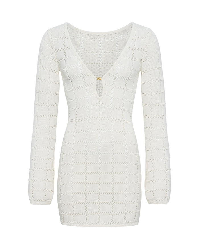 Off-model view of the LSPACE Jessa Mini in cream, a cream open-knit crochet mini dress with a geometric diamond pattern, V-neckline, and gold keyhole hardware.