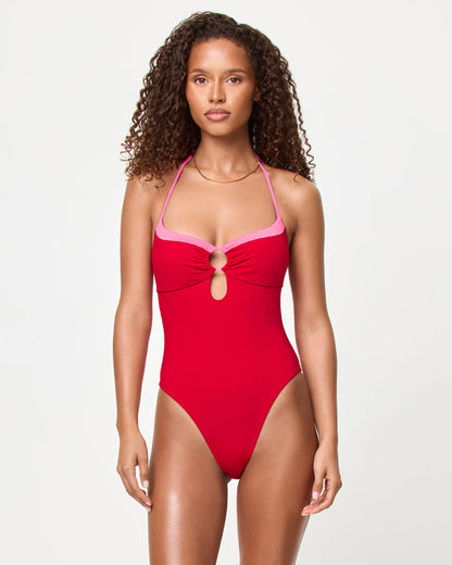 Front view of a model wearing the LSPACE Lipstick Red Sweetheart Juno One Piece Swimsuit.