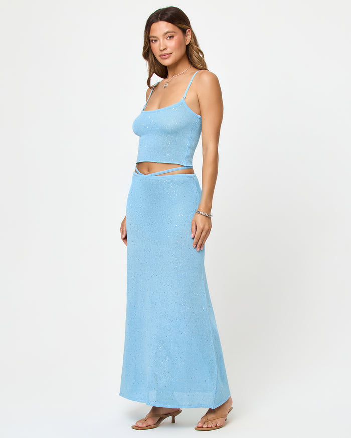 LSPACE Last Light Top and Skirt in Sky Blue, three-quarter view on model.