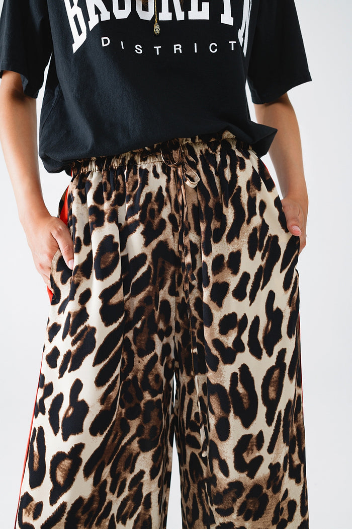 Leopard Straight Pants With Red Stripes Down The Sides - trousers