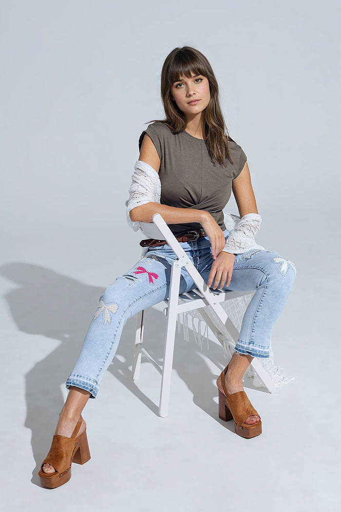 Light Blue Skinny Jeans With Bow ties and Ripped Holes - Denim