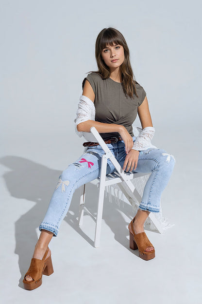 Light Blue Skinny Jeans With Bow ties and Ripped Holes - Denim