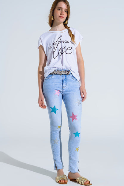 Light Wash Skinny Jeans With Stars On The Legs - Denim