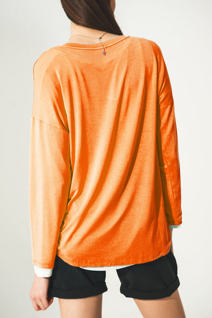 Long sleeve v neck top in modal in Orange - top