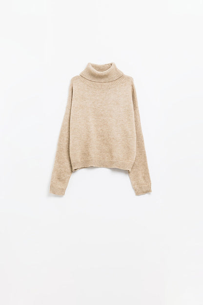Loose beige sweater with dropped sleeves