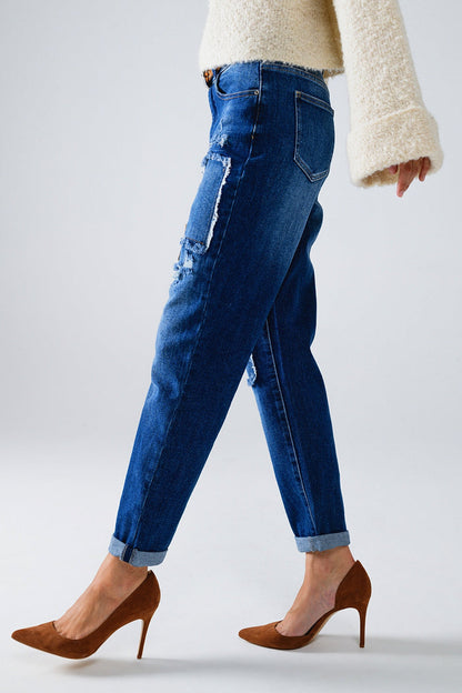 Loose blue jeans with subtle ripped design and patches - Denim
