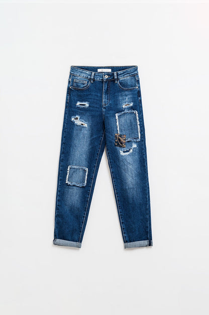 Loose blue jeans with subtle ripped design and patches - Denim