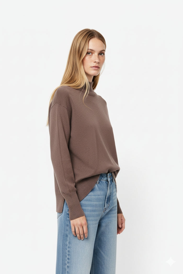 Loose brown sweater with open back detail