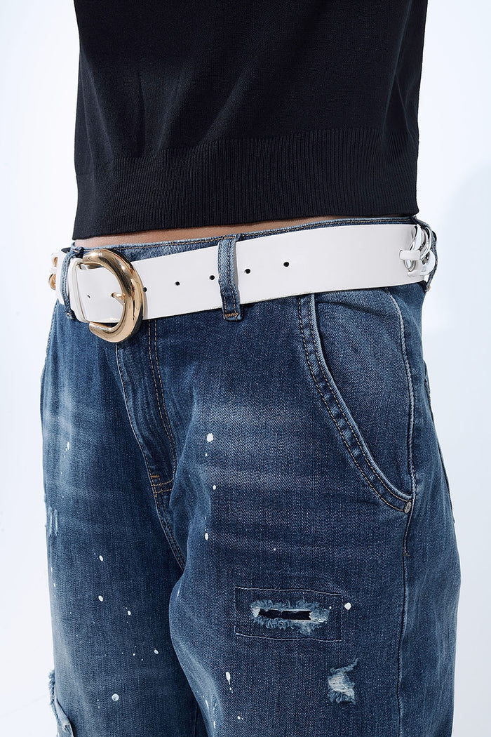 Loose-fitting jeans with distressed patches and paint details - Denim