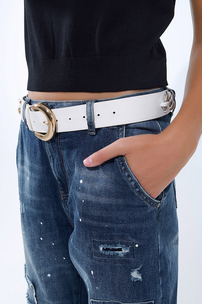 Loose-fitting jeans with distressed patches and paint details - Denim