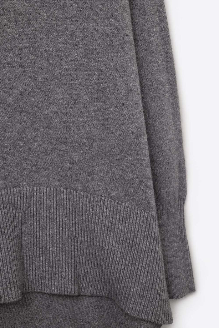 Loose gray sweater with open back detail