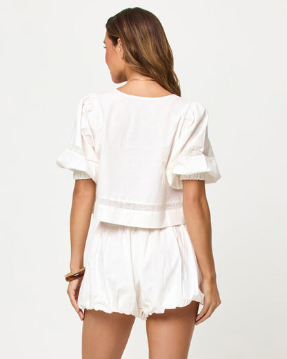 LSPACE Lucie Short in cream, back view on model.