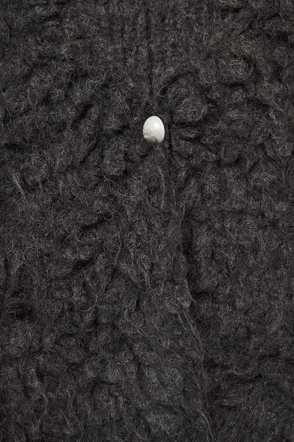 Luxurious vest with black long-haired texture