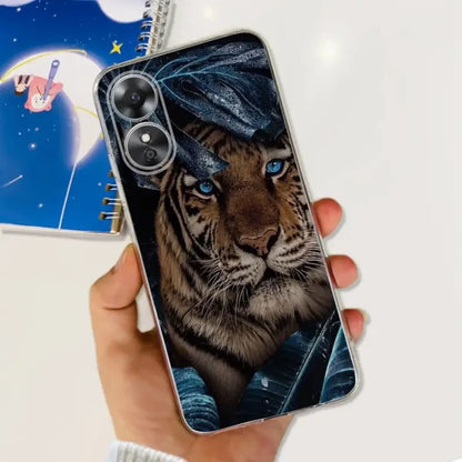 a hand holding a phone case with a tiger on it