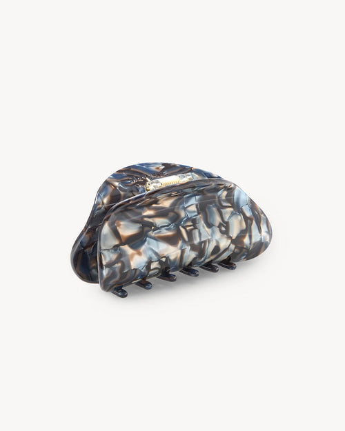 Side view of Machete Crescent Claw Clip in blue horn showing the steel spring