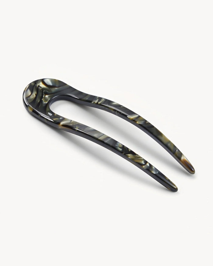 Angled view of the midnight horn Machete French Hair Pin showing the resin finish.