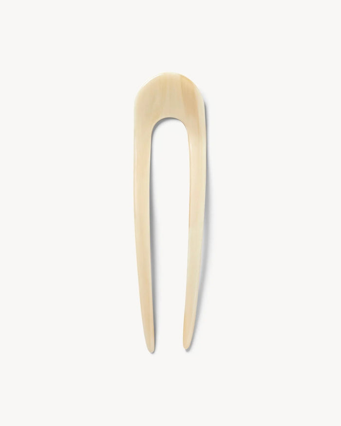 Off-model view of the white Machete French Hair Pin.
