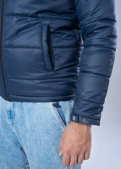 Navy quilted insulated jacket sleeve with snap cuff and chest pocket