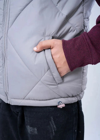 Grey quilted puffer vest-jacket with side pocket and zip-front design