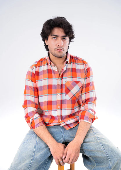 Men's orange plaid button-up shirt with collar and chest pockets, long sleeves