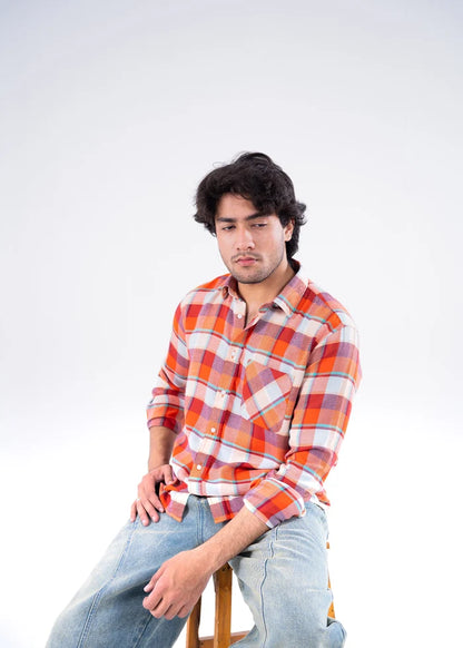 Men's orange plaid button-up shirt with chest pockets and buttoned cuffs, long sleeves