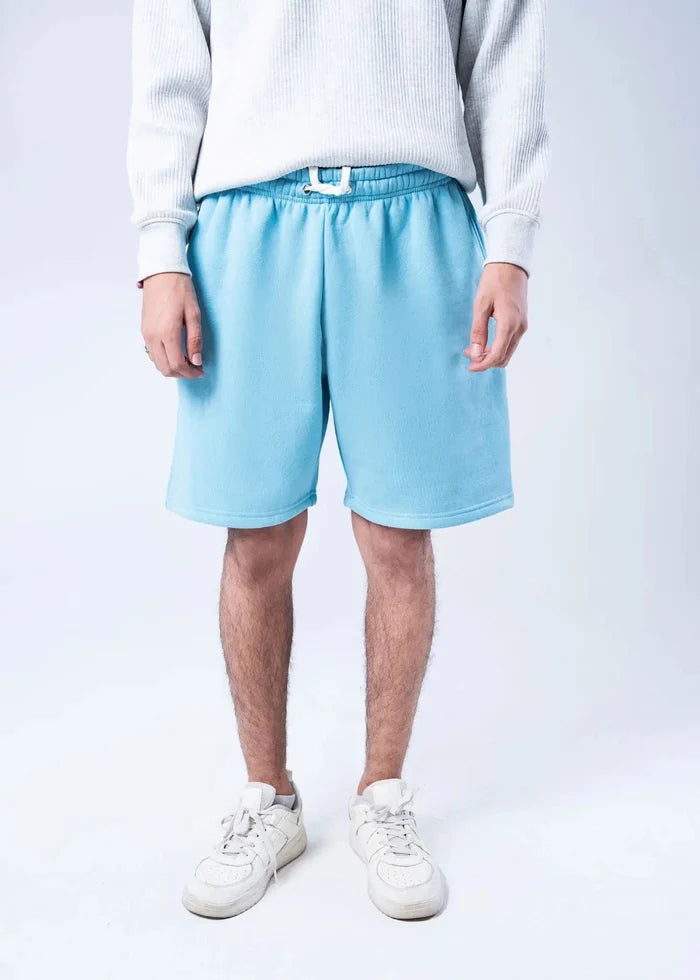 Men's sky blue fleece shorts with elastic waistband and drawcord