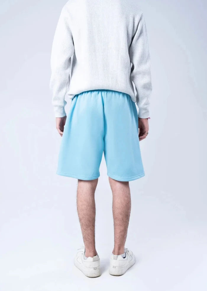 Men's sky blue fleece shorts, back view, elastic waistband