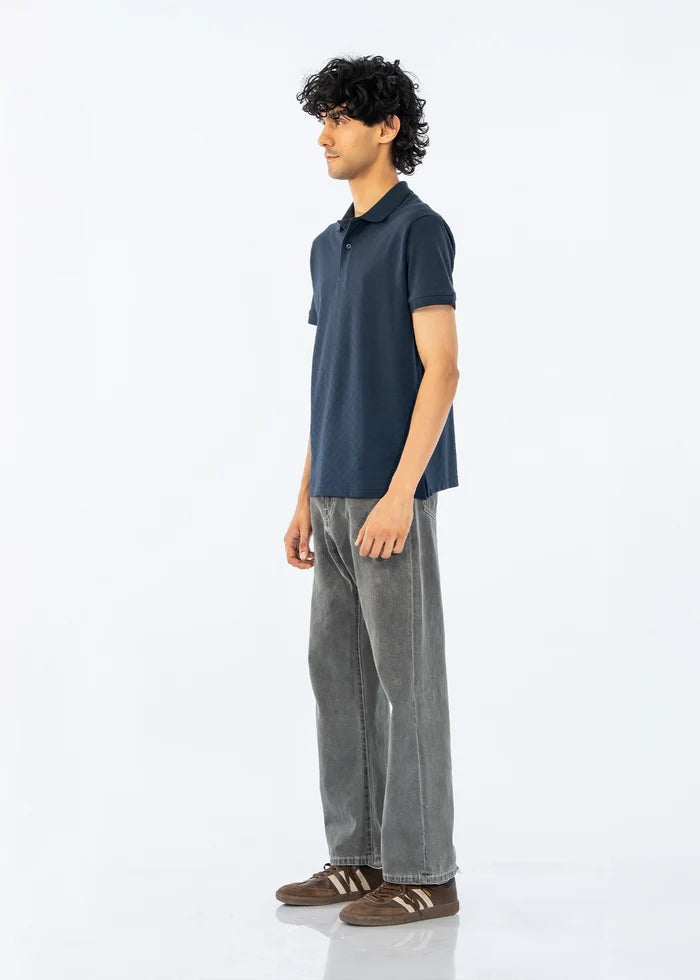 Men's dark polo shirt with short sleeves, side view showing collar and placket