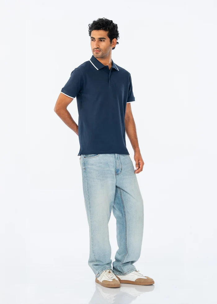 Navy polo shirt, short sleeves with white-trim edges and button placket