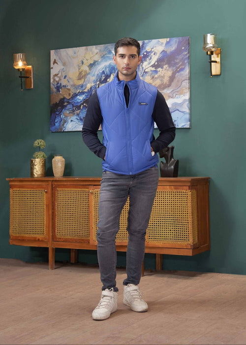 Men's blue quilted puffer jacket with front zipper and stand collar