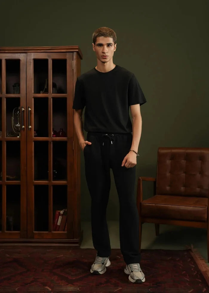Men's black pull-on winter trousers, full-length relaxed fit with drawstring waist