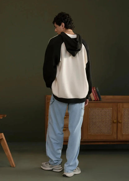 Men's zip-front pullover hoodie, back view with black hood and stone body panel