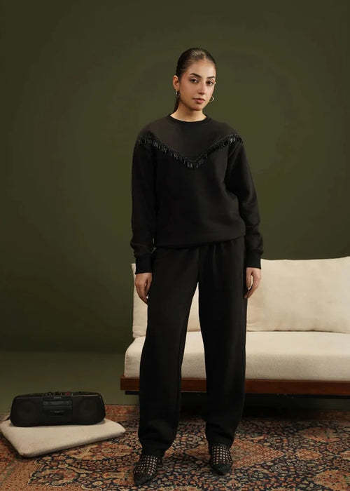 Black crewneck fleece sweatshirt with V-shaped fringe trim and relaxed fit
