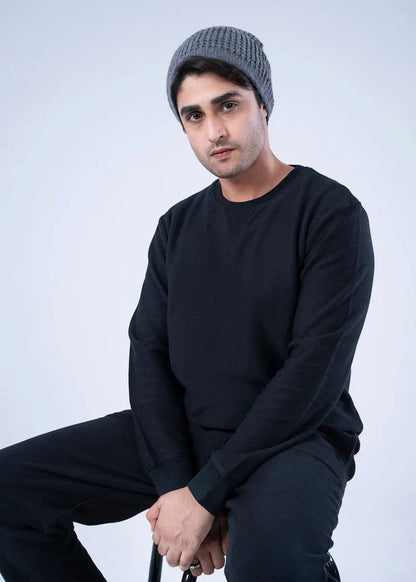 Men's black winter sweatshirt with long sleeves and crew neckline; close-up of fabric and seams.