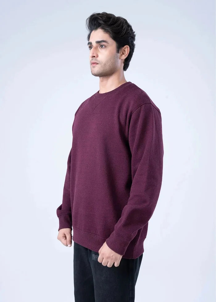 Men's burgundy crewneck terry sweatshirt, side view with long sleeves and cuffs