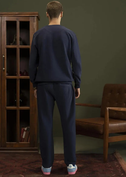Navy crewneck sweatshirt from back, long sleeves with ribbed cuffs