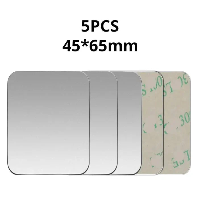 a close up of a mirror with a white background and a green line