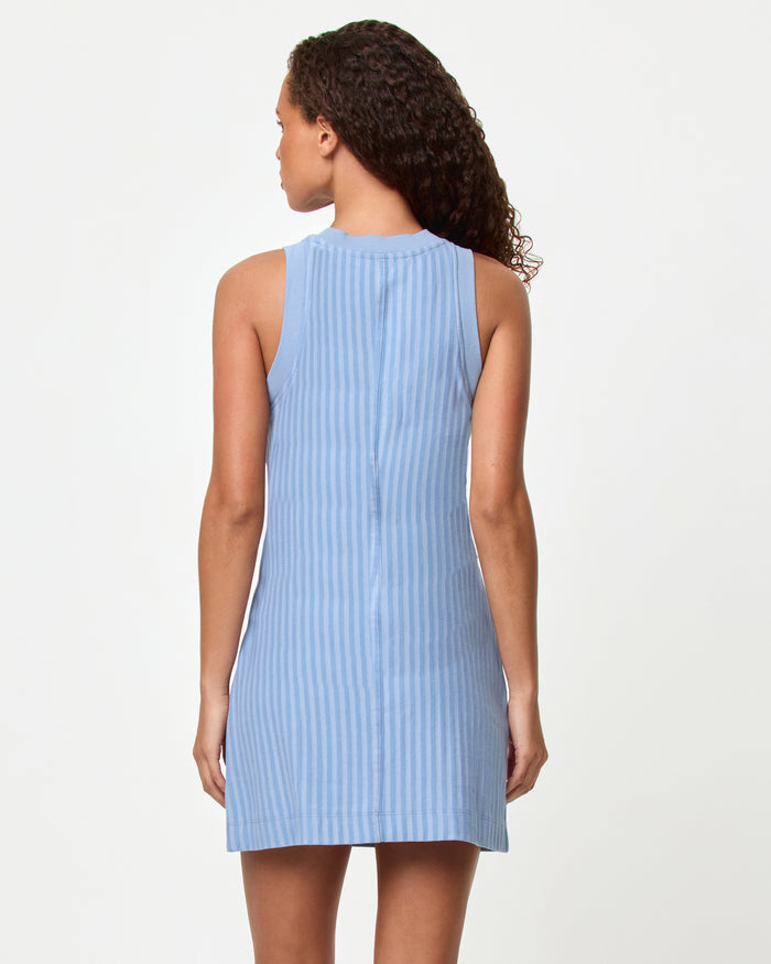 LSPACE Muse dress in chambray, back view on model.