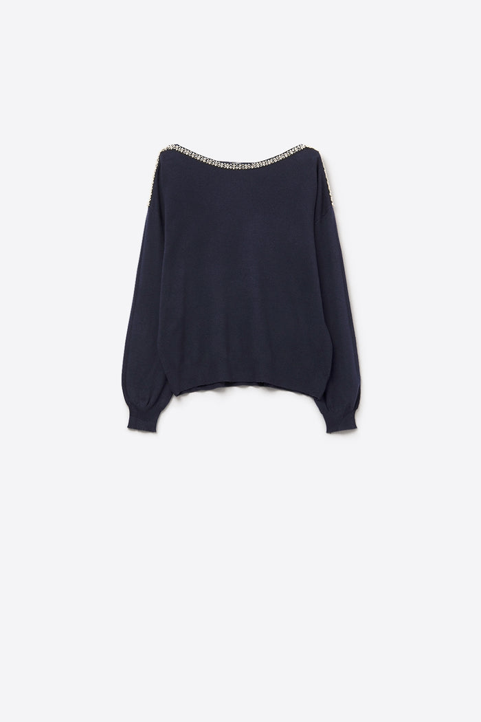 navy fine knit sweater with a boat neck and rhinestone detail